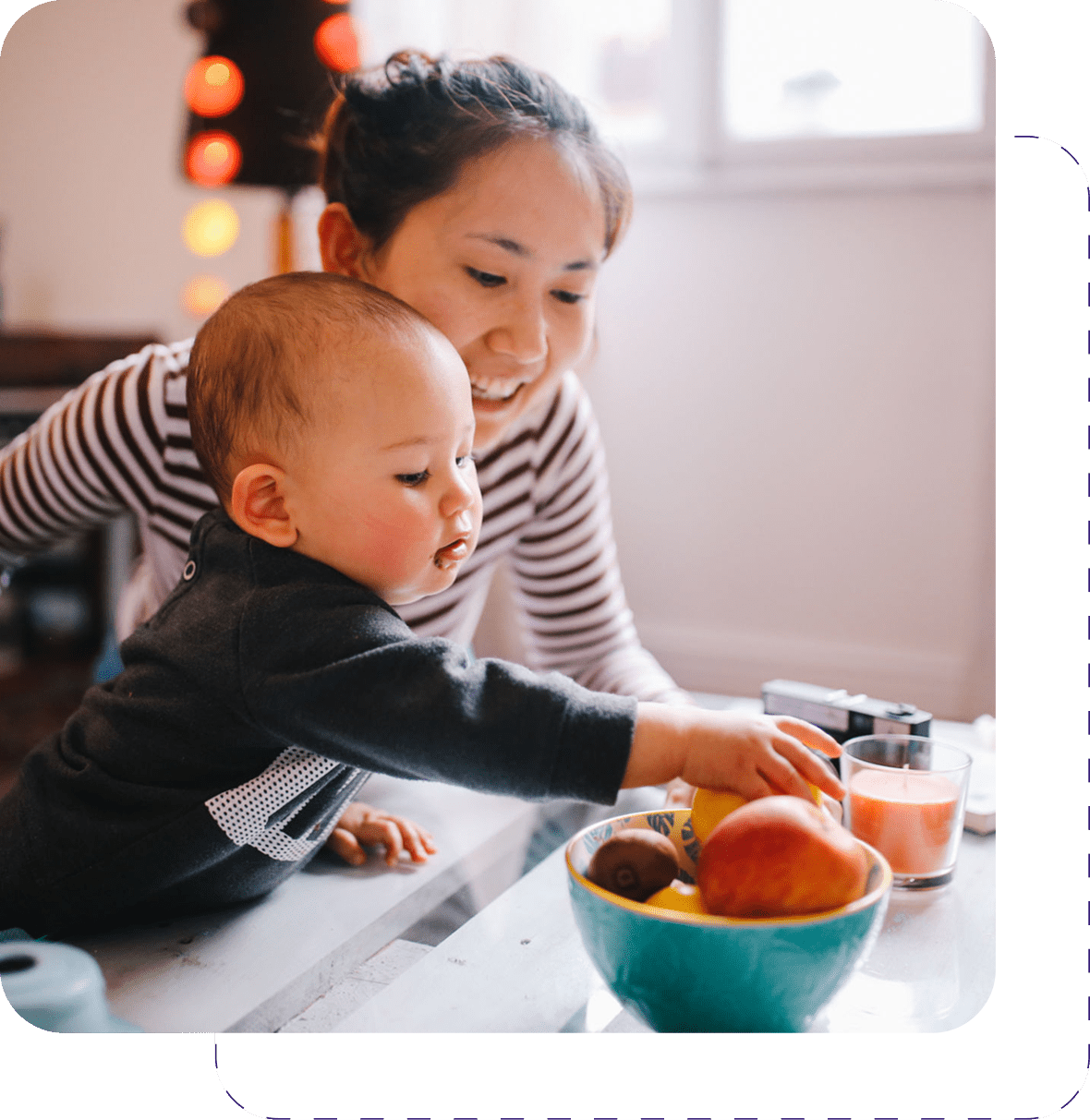 Toddler and mom enjoying snack time together