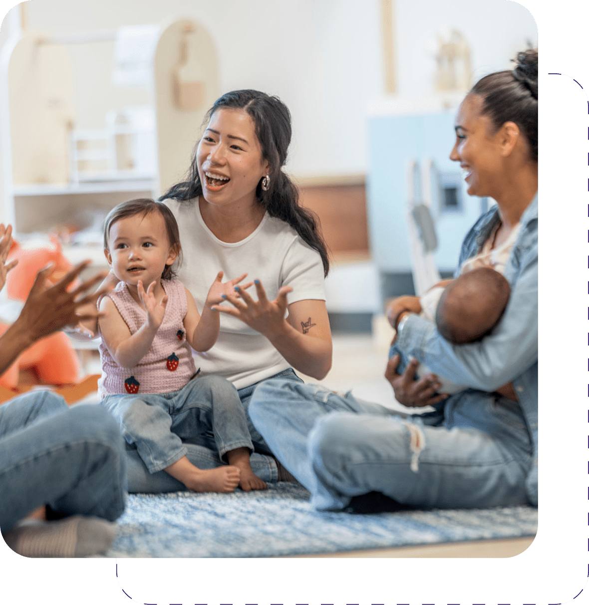 Group of moms with babies sitting together